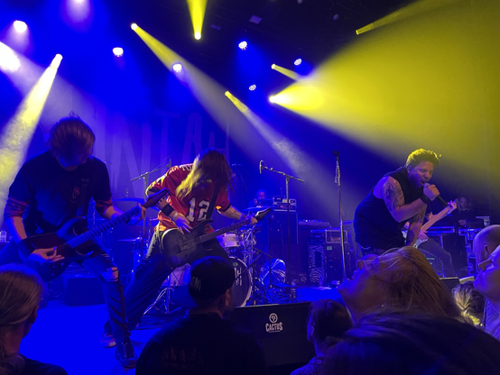 Front stage picture of metal band Mantah playing a gig