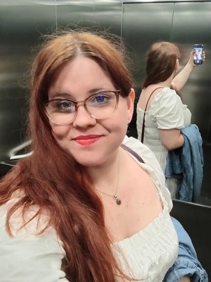 Me in a lift taking a selfie.