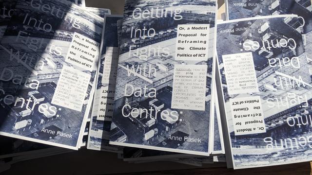 Print copies of my zine Getting Into Fights with Data Centers. The blue and black riso inks turned out nice and understated.