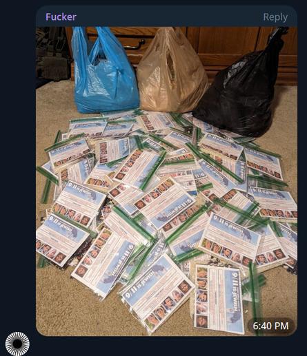 a pile of antisemitic flyer bags collected and bagged with weights for throwing from a vehicle as part of Goyim Defense League antisemitic propaganda
