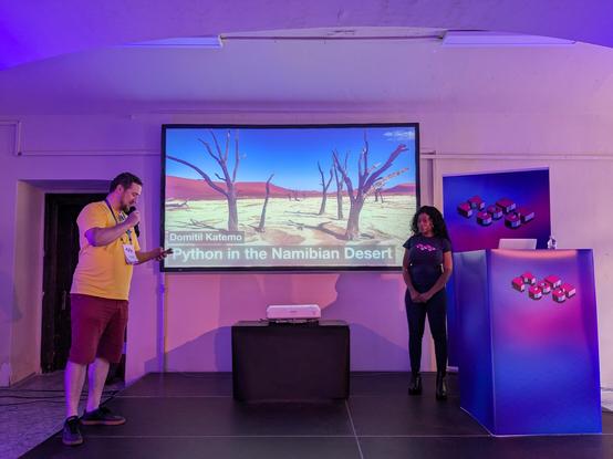 Domitil gets I introduced on stage.