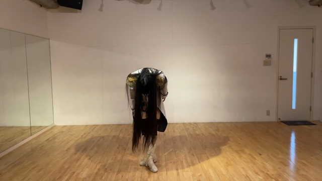Himari bowing with a curtain of hair.