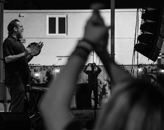 The band The Connells performing outside behind the Cat’s Cradle in Carrboro