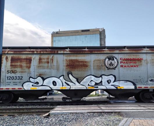 Train car with graffiti rolling through Kamloops BC Canada