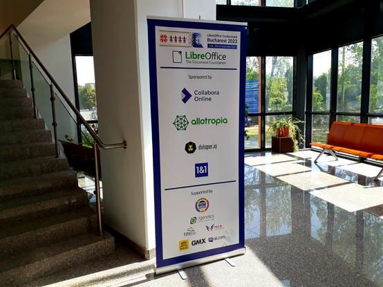 Roll-up banner with conference supporter and sponsor logos