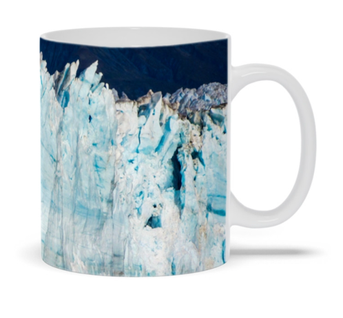 Mug with image of jagged teeth of old glacial blue ice looming up from an ocean view