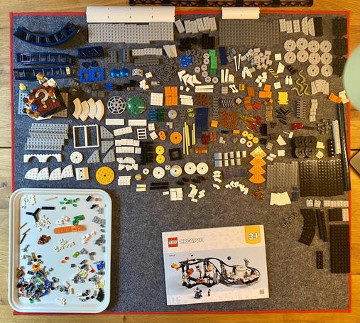 Top down photo of all the bricks; somewhat organized.