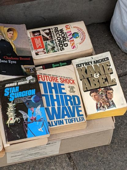 English language paperback books for sale from a sidewalk vendor in Tbilisi, Georgia.