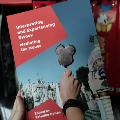 A cover or a book called Interpreting and Experiencing Disney. Mediating the Mouse. Edited by Priscilla Hobbs.