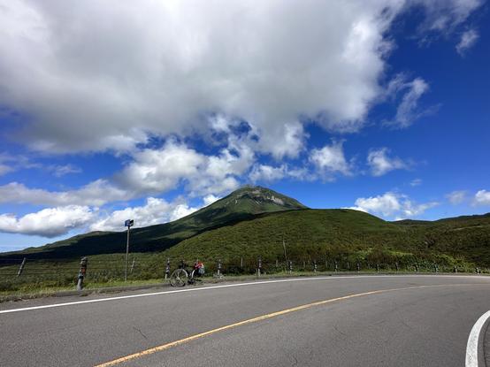 Another view of Mount Rausu from further up the hill. This time we’re looking across the road and my bike is in frame.