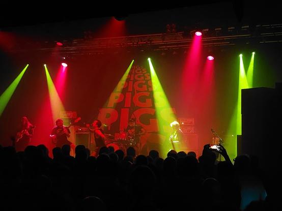 Band pigsx7 on stage in Glasgow