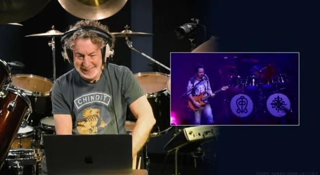 Simon Phillips. Still 1st choice for the debut album if you can get him
