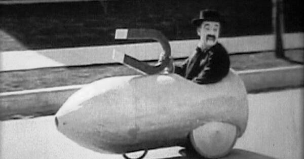 Snub Pollard in his magnet-powered car