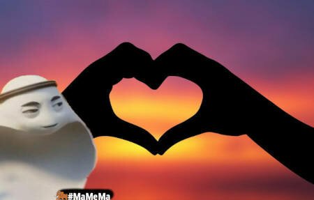 the mascot of the fifa quatar football championship (who is supposed to look like a kiyffah but rather looks like a ghost) looking resentfully at two hands forming a heart in sunset
