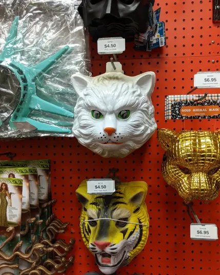Photo of cheap plastic masks arranged on a display