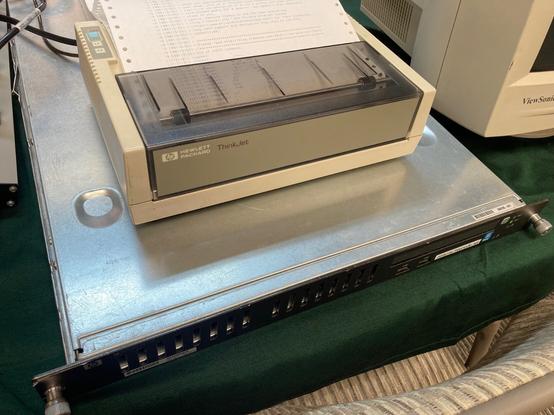 An HP ThinkJet printer on top of an HP DL180 freenode server