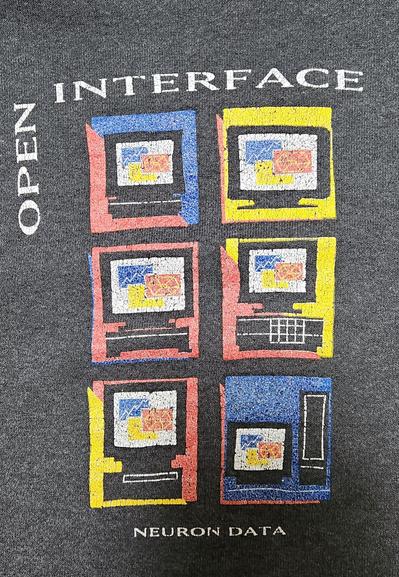 A black tshit showing 6 competing GUI and the company name Neuron Data with the product Open Interface.