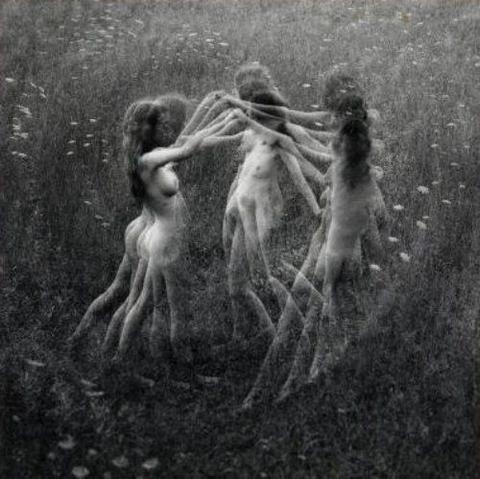 nude women dancing in circle, distorted with multiple exposure photography effect