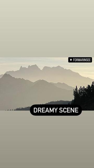 Hazy sunset mountain shapes.