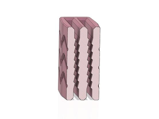 The illustration of a webbing buckle with a cut showing the zig-zag pattern inside.