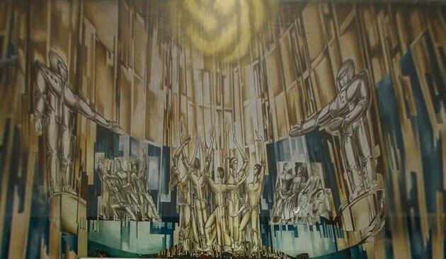 a soviet realism style mural painting brown yellow and emerald green dominate two cosmonauts one on each side point to a mass cheering/praisibg in the middle, there hands reached out to the hights; where i shopped in a chatgpt logo in form of a sun remark this was not an easy one, i wasnt able to find a better pic than the one i stumbled upon; and it had an angle that required quite some "reinterpretation"