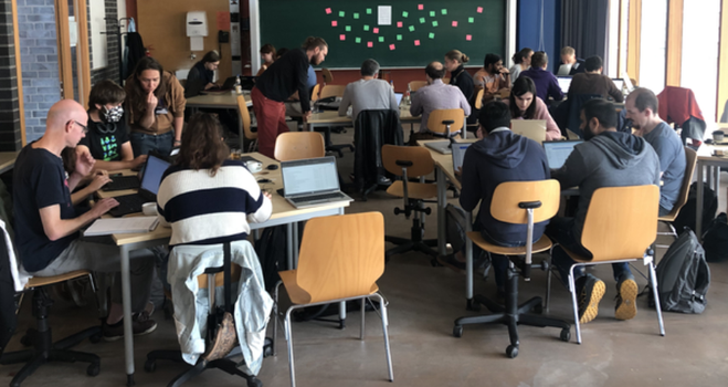 Participants at work at the CoFest