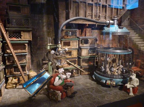 a scene set form the Wallace and Gromit movie. In the basement, a weird contraption of Wallce's invention. Wallace in chair, excited, and Gromit looking bemused.