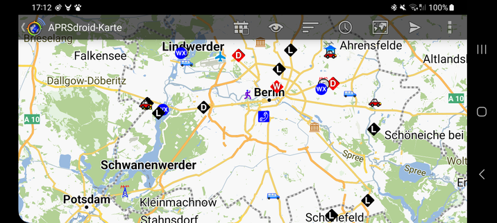 Landscape screenshot of the APRSdroid app, showing a map with APRS station symbols but no callsign text
