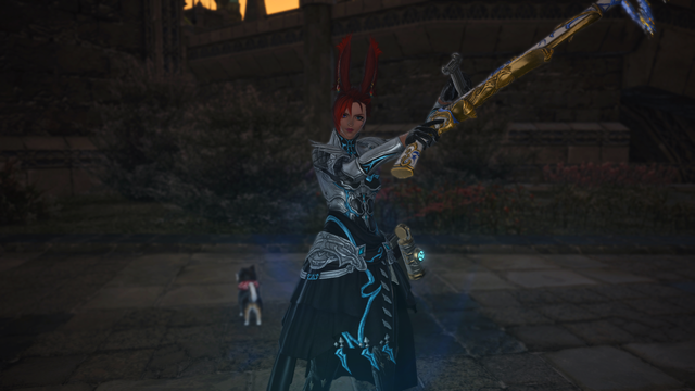 Rav in the new ARaid coat dyed a blue color, holding her gun in one hand and a wrench in the other as she looks annoyed forwards at the camera.