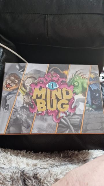 Box for the Mindbug card game, features cool looking creatures
