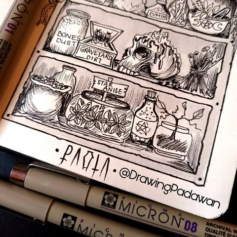 Detalle del dibujo terminado y bolis alrededor.