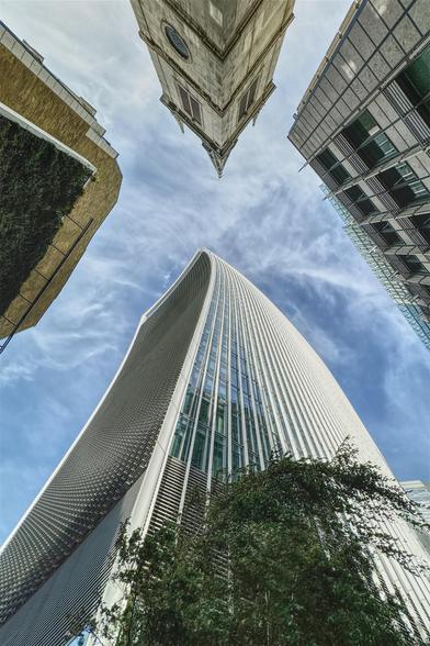 Photo taken looking up at the Walkie Talkie building in London