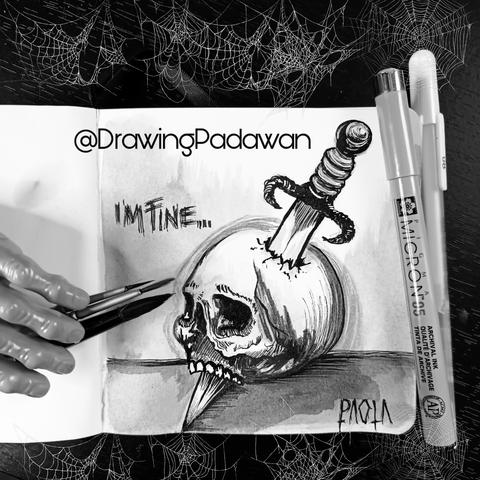 Dibujo terminado con pinceles y bolis alrededor.