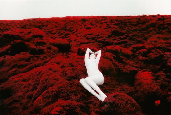 painted photo: pale woman on vibrant red ground