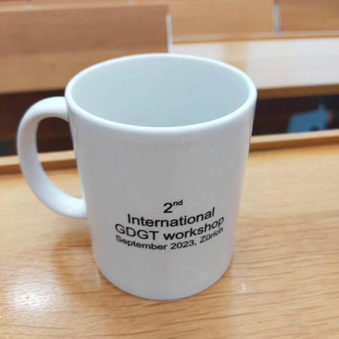 Same nerdy mug as in the other photo but viewed from the other side.
The name of the (niche) international workshop to which Nina Davtian participated in September 2023 and the name of the city where this workshop was organized are visible.
GDGT stands for "glycerol dialkyl glycerol tetraether" and is the abbreviated name of Nina Davtian's favorite membrane-spanning lipids.