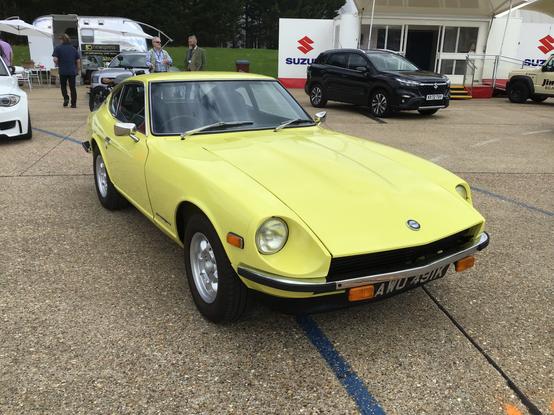 Yellow Nissan 240Z, front quarter view