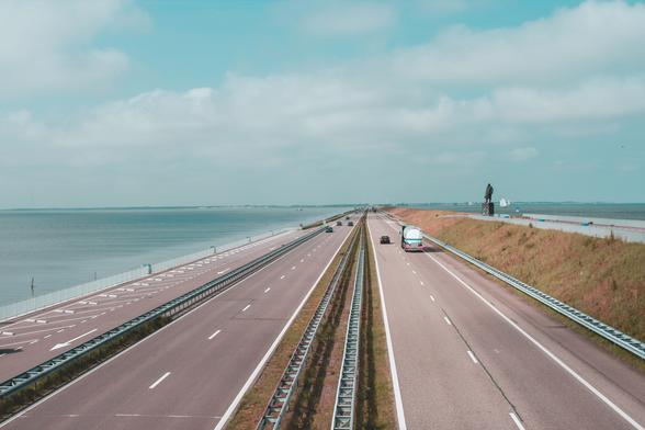 The Afsluitdijk seperates the inland from the North Sea in the Netherlands. On the left lies the IJsselmeer, previously known as Zuiderzee. It was cut off from the North Sea by the Afsluitdijk dyke built in 1932 and about 45% of the former sea was reclaimed as polders. Presently it is a vast shallow freshwater lake (up to 4-5 m depth) and the largest freshwater basin in the country.
