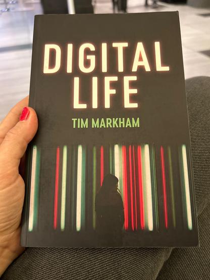 A book is pictured with the title digital life by Tim Markham