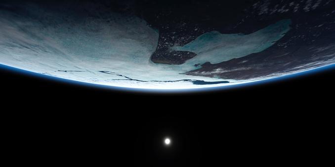 The arc of an icy pkanet hangs above a distant sun