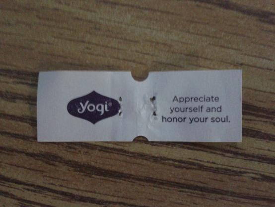 closeup of a Yogi tea bag label showing the words « Appreciate yourself and honor your soul. »