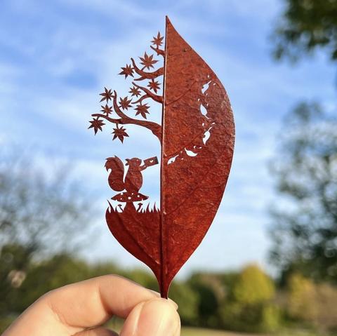 a nearly read leaf with a cutted motive of an eichhœrnchen and a tree

Source: https://instagram.com/lito_leafart

lito-leafart.com