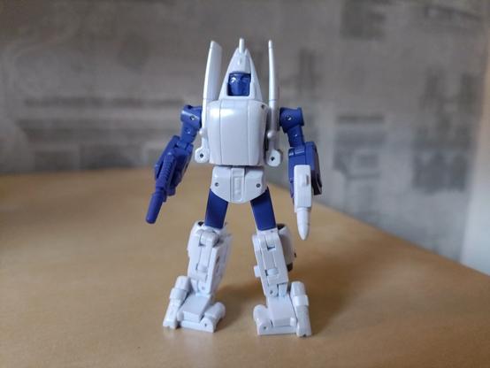 The Gobot Bad Boy in robot mode, in his white and blue Transformer body based on the Powerglide mold. This toy is made by third party company, New Age.