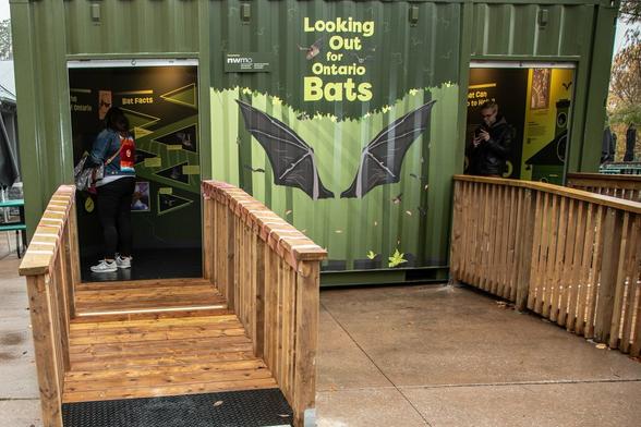 Azure Generated Description:
a group of people standing outside a building (35.32% confidence)
---------------
Azure Generated Tags:
waste container (95.54% confidence)
text (94.77% confidence)
outdoor (93.22% confidence)
door (88.36% confidence)
plant (85.32% confidence)
street (62.15% confidence)
wooden (61.47% confidence)
