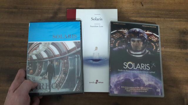 My DVD copy of "Solaris" directed by Tarkovsky (1972) on the left. My spanish edition copy of "Solaris" (book) by Stanislaw Lem (1961) on the center. My DVD copy of "Solaris" directed by Soderberg (2002) to the right.