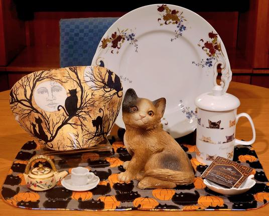A Kitty Halloween tea tableau with decaffeinated Ceylon black tea fro Harney and Son.