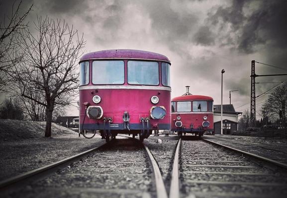 Colour key photo of a disused purple VT 98 train on rails in a railway museum in Ocholt, Germany.