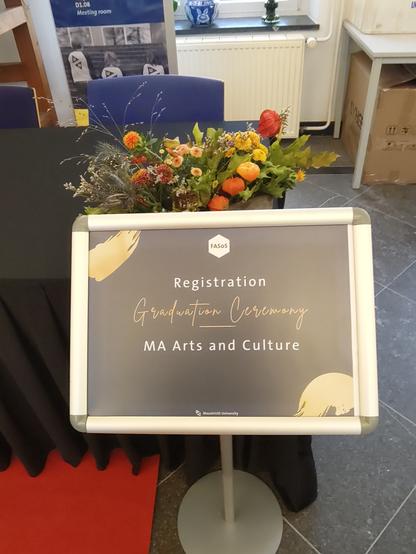 registration desk for MA graduation at FASOS