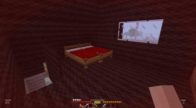 A black bedroom made out ob black wool. There are two red beds and a glass window.