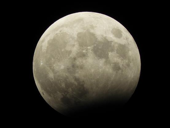 Full moon with partial eclipse