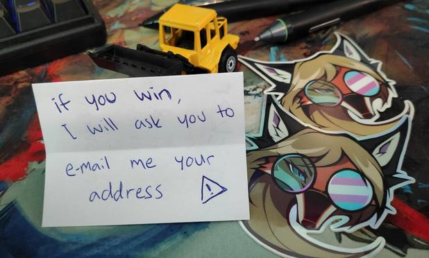 Photo with transport info "if you win, I will ask you to e-mail me your address". It's a real physical postcard envelope. I spent a month trying to figure out if I can ship a regular postcard to USA without the customs form attached, because the form is so big that it covers the entire envelope and also makes it too heavy for regular postcard class, resulting the shipmemt to double in price. I arrived at a conclusion that information is mixed and thus uncertain. You can still enter at your risk if you think your country will allow it, but there is a chance that it gets trashed on the way.